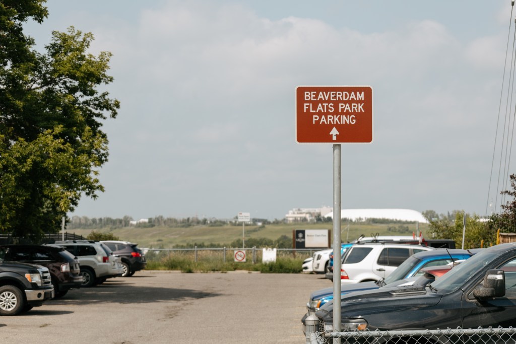 Idle vehicles pile up on Ogden public lot as signage gaps stall Calgary Parking enforcement